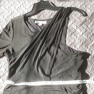 One sleeve LBD. Black size M BCBG little black dress.